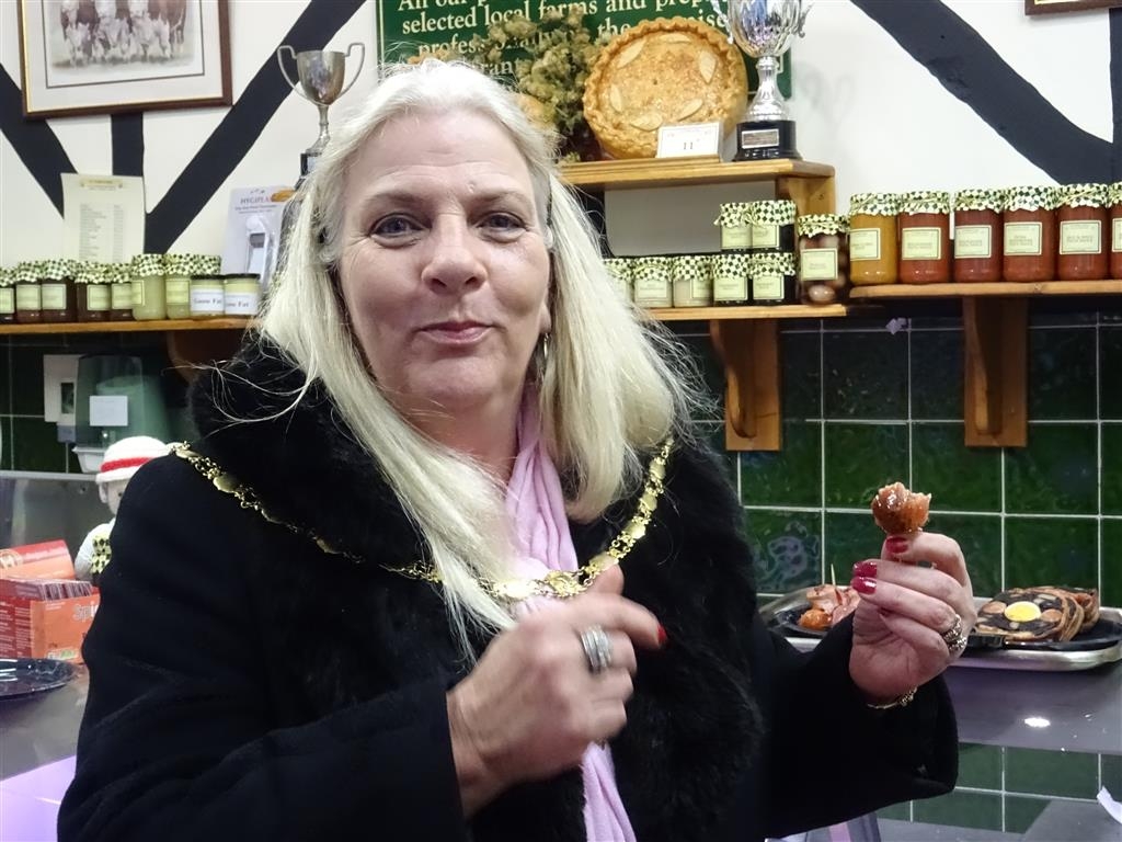 LFG Town Mayor Annette Crowe enjoys a sausage at Wallers